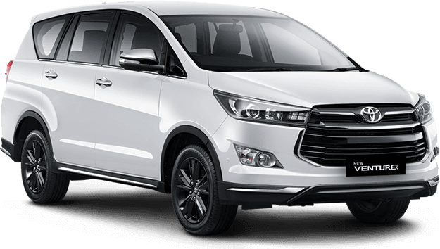 White Toyota Innova Crysta parked at the roadside